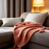 Couverture plaid 100% coton rose saumon avec pompons 130x170cm ARNISKA ->Sacasa New