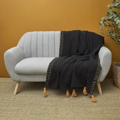 Jeté de canapé surpiqué pompons noir 130x150 cm><noscript><img width=