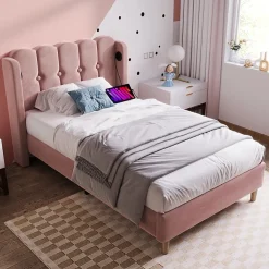 Lit 90x200 cm avec tête de lit à panneaux, tapissé velours rose et station de charge USB-C intégrée><noscript><img width=