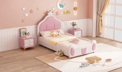 Lit 90x200 cm avec tête de lit en forme de couronne, revêtement simili cuir blanc et rose, cadre métal et panneaux bois><noscript><img width=