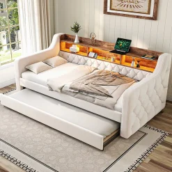 Lit 90x190 cm en velours beige avec rangement intégré, au design moderne et gain de place idéal pour studio>Redom