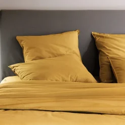Linnea Taie d'oreiller PALACE pur coton lavé 65x65 cm uni jaune curry* Taie D'Oreiller